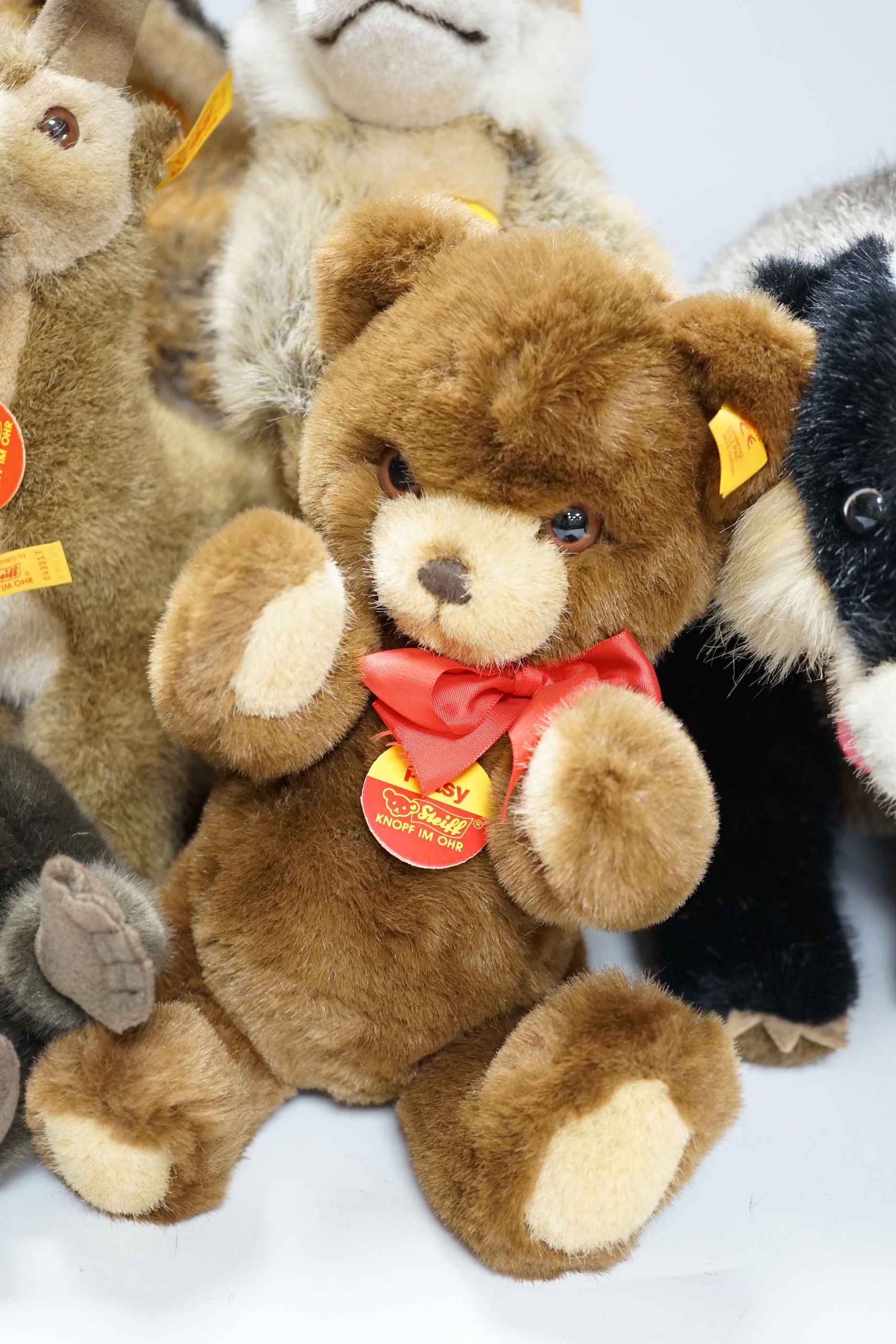 Seven Steiff animals, yellow tag: bear, Sigi badger, Rocky, Muneeb hare, Meerkat and others